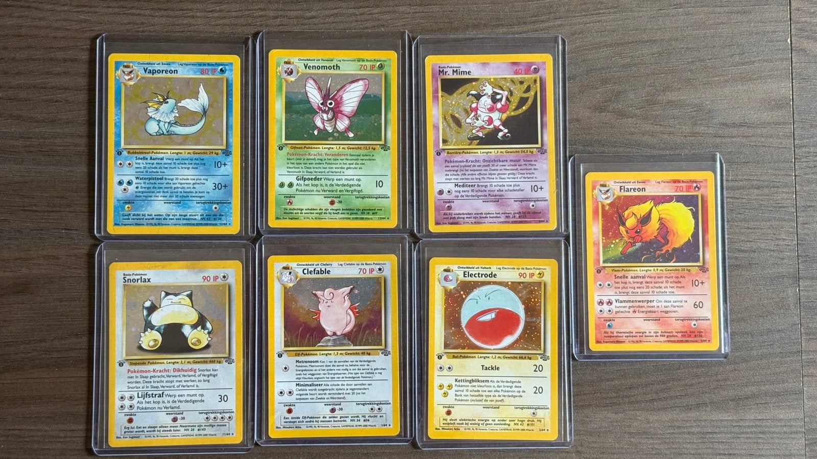Pokémon Jungle 1st Edition Nederlands 7 Holo Kaarten, Verzenden, Gebruikt, Meerdere kaarten, Foil