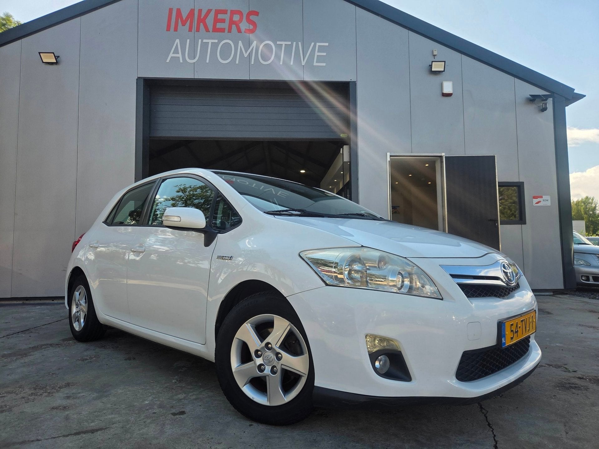 Toyota Auris 1.8 Full Hybrid Business, Auto's, Toyota, Euro 5, Stof, Gebruikt, Zwart