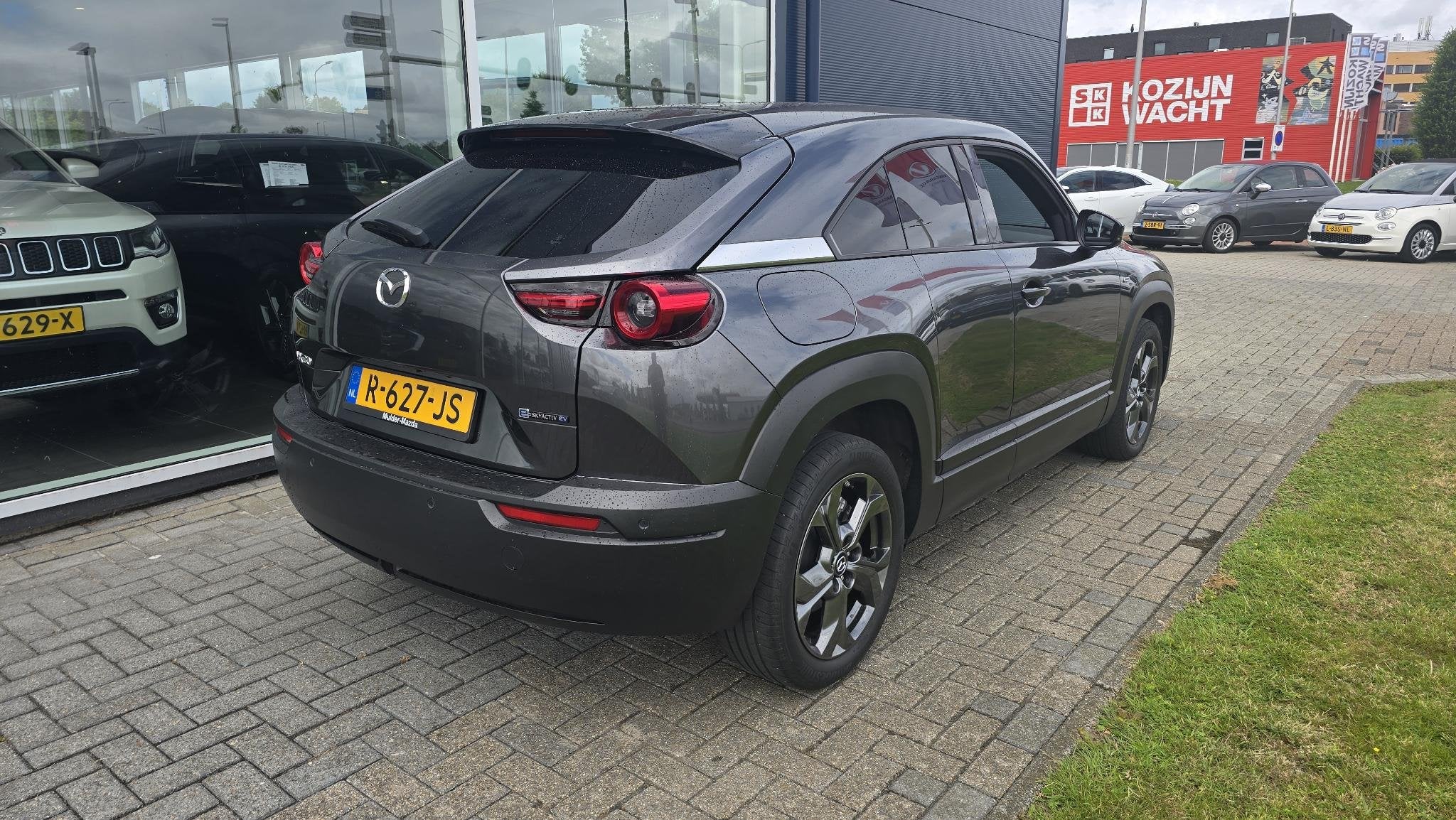 Mazda MX-30 e-SkyActiv EV 145 Advantage 36 kWh |NAP|1e eigen, Auto's, Mazda, 145 pk, Gebruikt, Zwart, Leder en Stof
