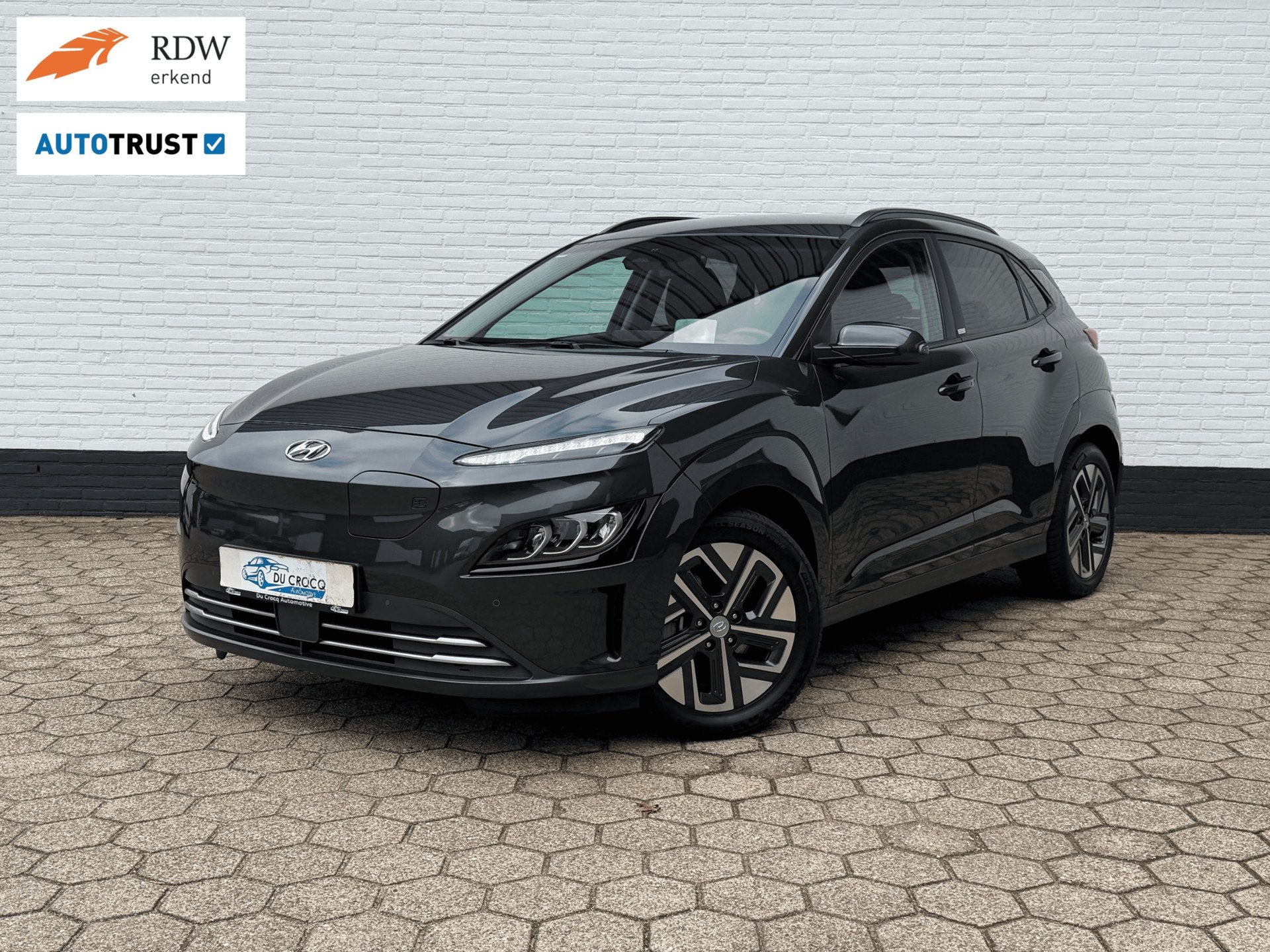 Hyundai Kona EV Premium 64kWh ACC l WARMTEPOMP l TREKHAAK l, Auto's, Stof, Gebruikt, 100 %, 40 min