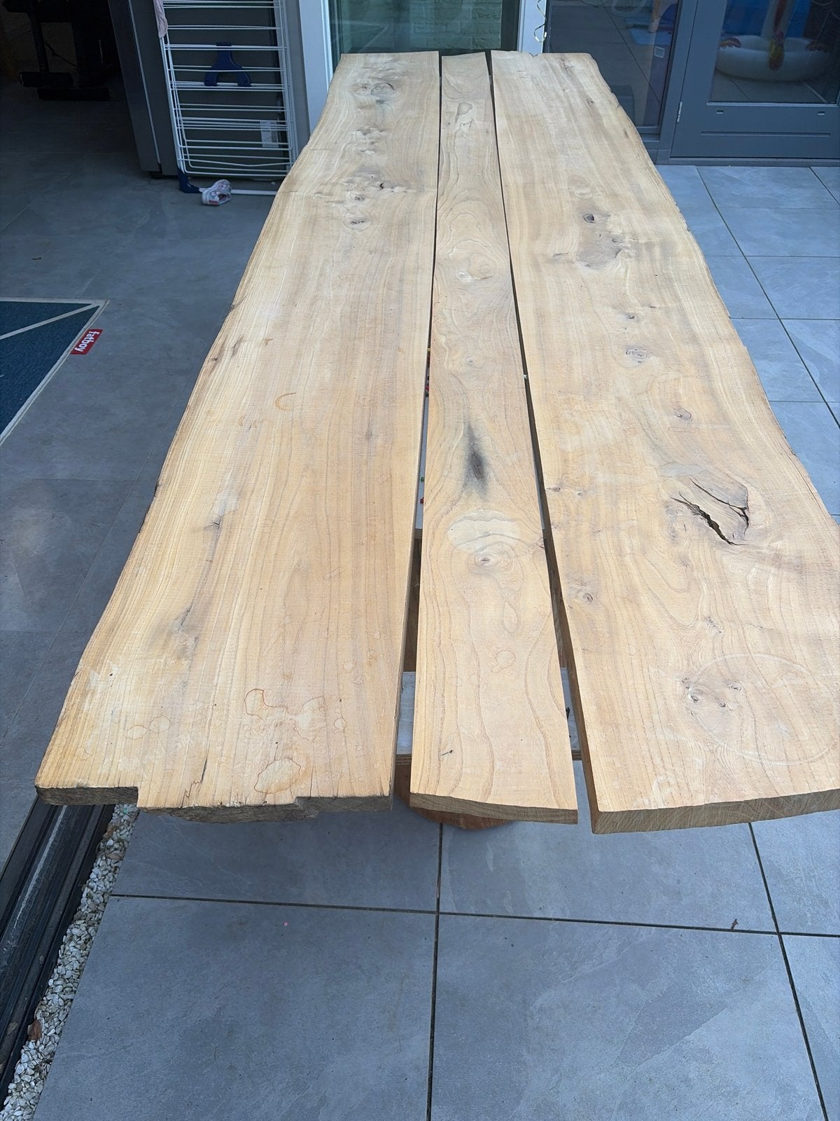 Massieve houten tafel met boomstam poten (295x90 cm), Ophalen, Gebruikt, 200 cm of meer, 50 tot 100 cm