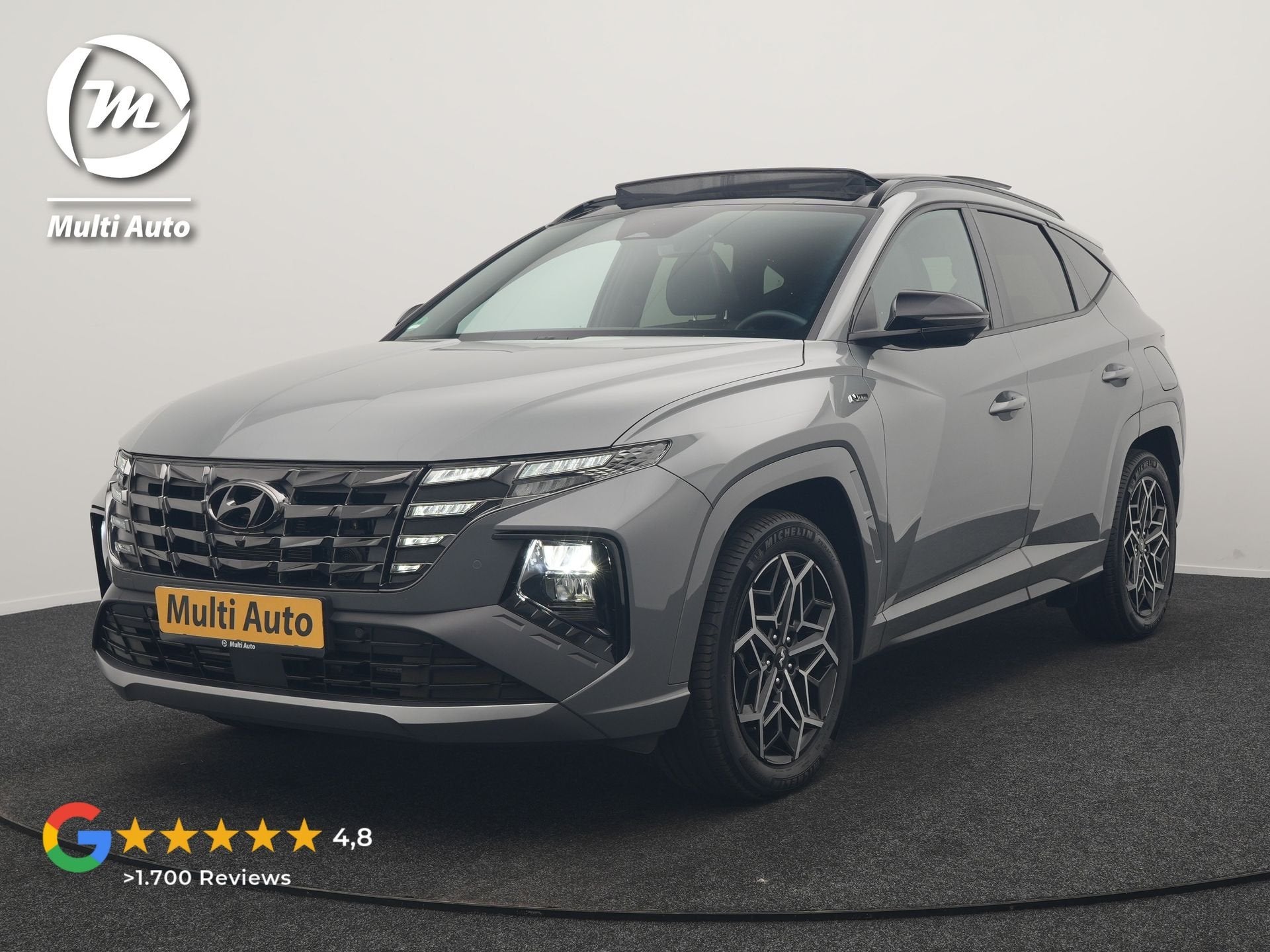 Hyundai Tucson 1.6 T-GDI PHEV N Line Sky 4WD 265pk Dealer O., Auto's, Automaat, Gebruikt, Zwart, 4 cilinders