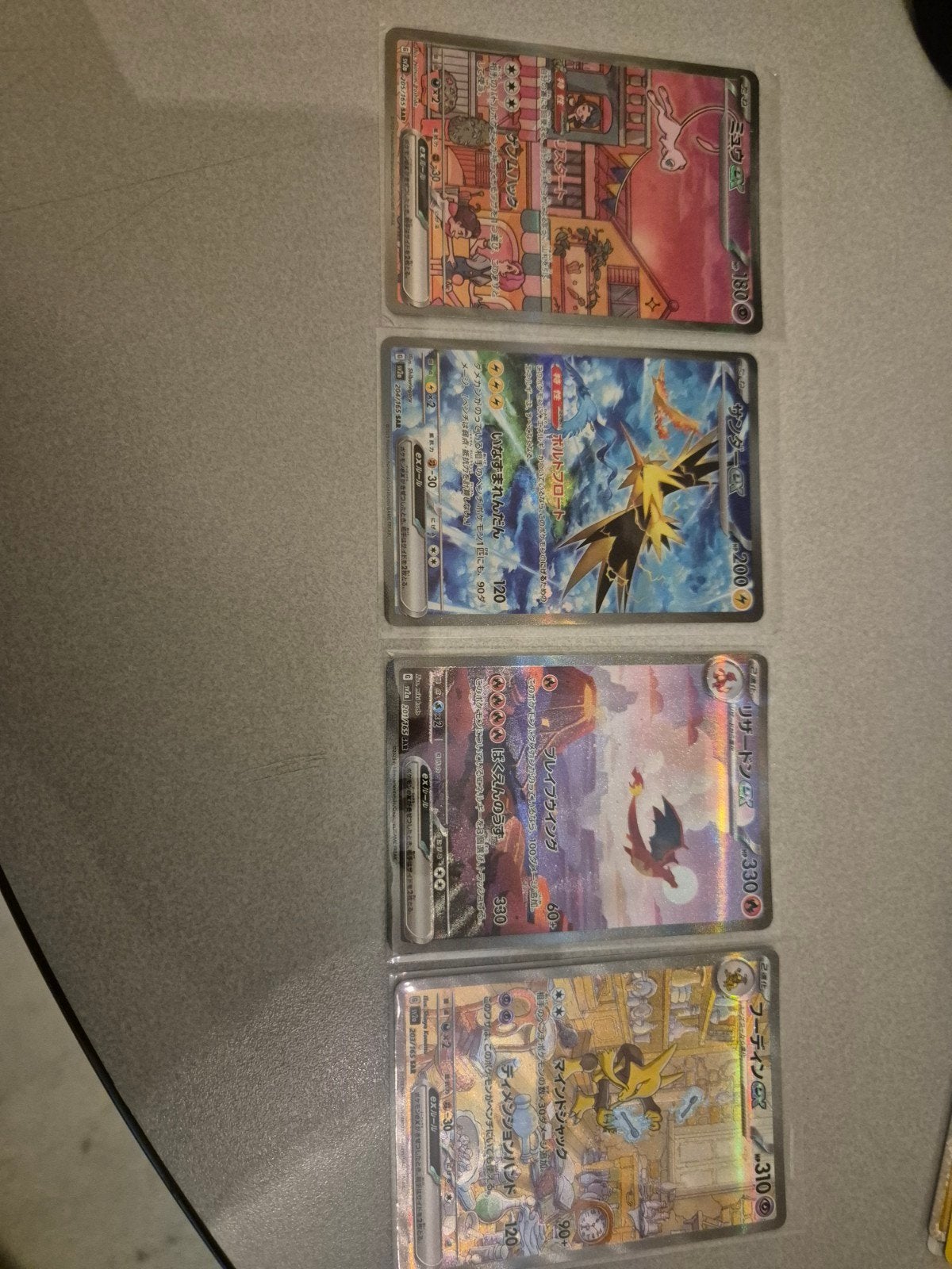 Zeldzame Japanse Pokémon kaarten - Charizard, Zapdos, Alakaz, Ophalen of Verzenden, Zo goed als nieuw, Meerdere kaarten, Foil