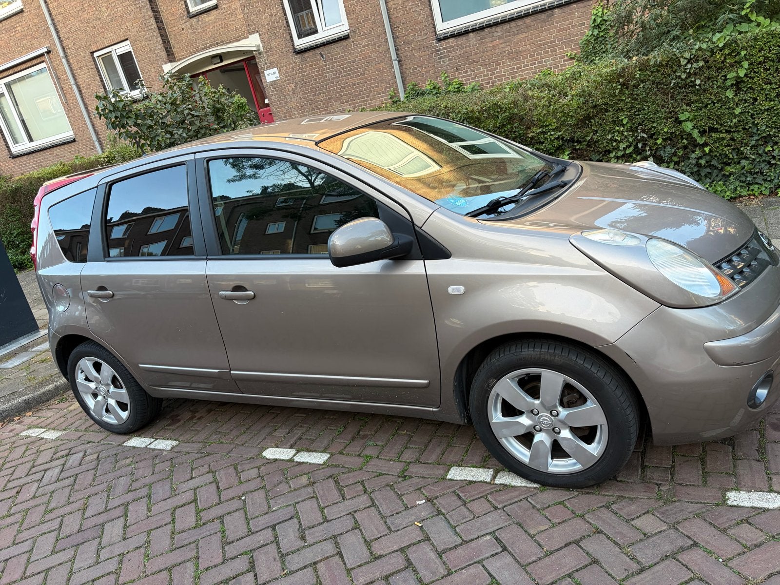 Nissan Note, NAP, TREKHAAK, 1.4 16V 2008 Bruin, met trekhaak, Voorwielaandrijving, Elektrische ramen, 40 €/maand, 4 cilinders