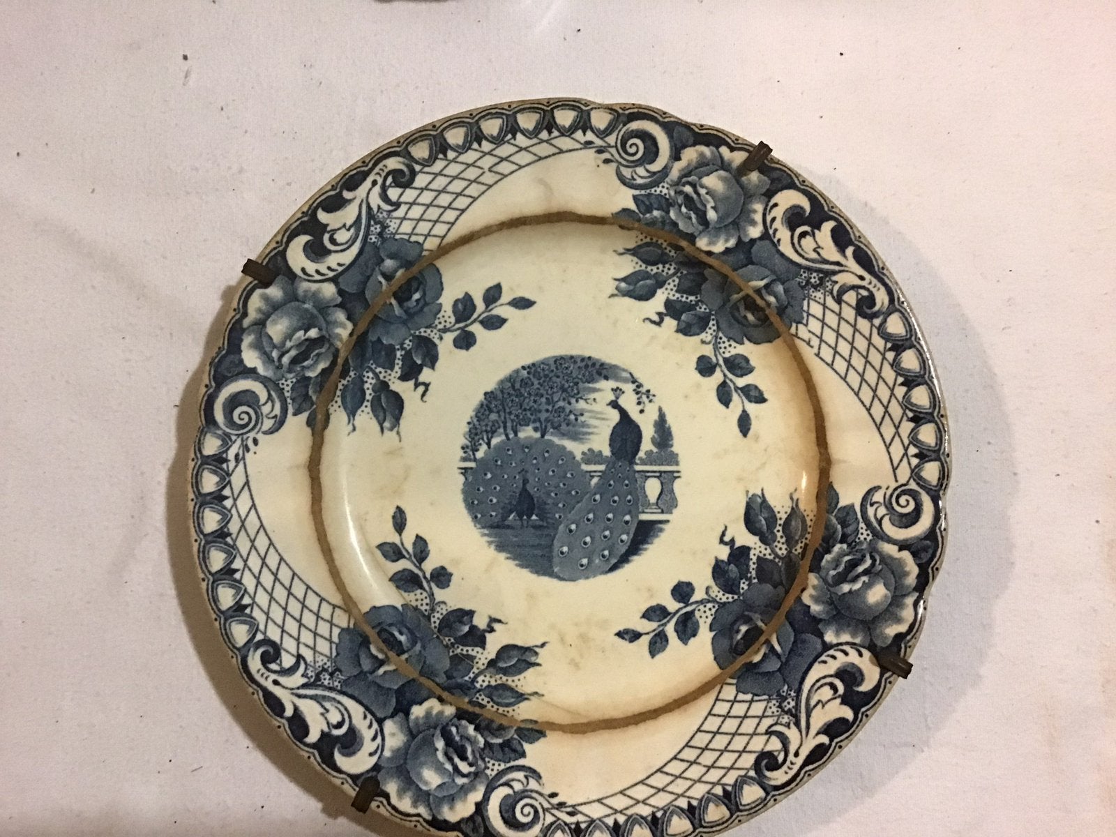 Antiekwandbord met pauw, Antiek en Kunst, Antiek | Wandborden en Tegels, Ophalen of Verzenden