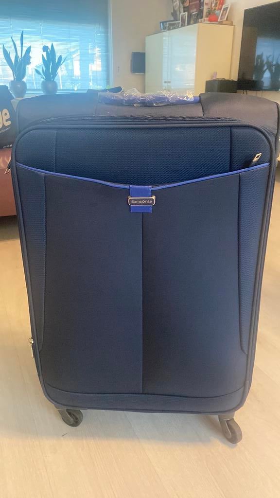 Samsonite Dark blauwe koffer met 4 wielen, Ophalen of Verzenden, Zo goed als nieuw, Hard kunststof, 70 cm of meer