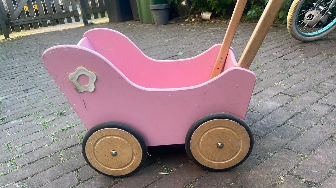 Houten poppenwagen, Ophalen, Gebruikt