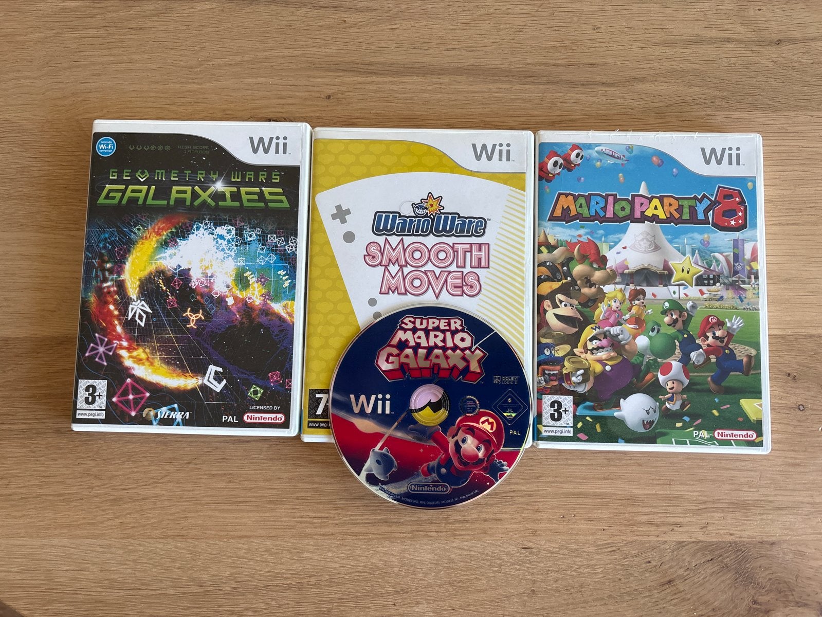 Wii Games: Super Mario Galaxy, Mario Party 8, Geometry Wars, Spelcomputers en Games, Gebruikt, Eén computer, Ophalen of Verzenden