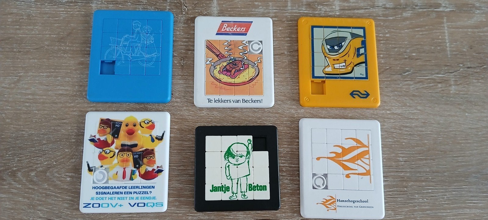 6 Schuifpuzzels retro reclame NS jantje beton beckers, Ophalen of Verzenden, Minder dan 500 stukjes, Gebruikt, Overige typen