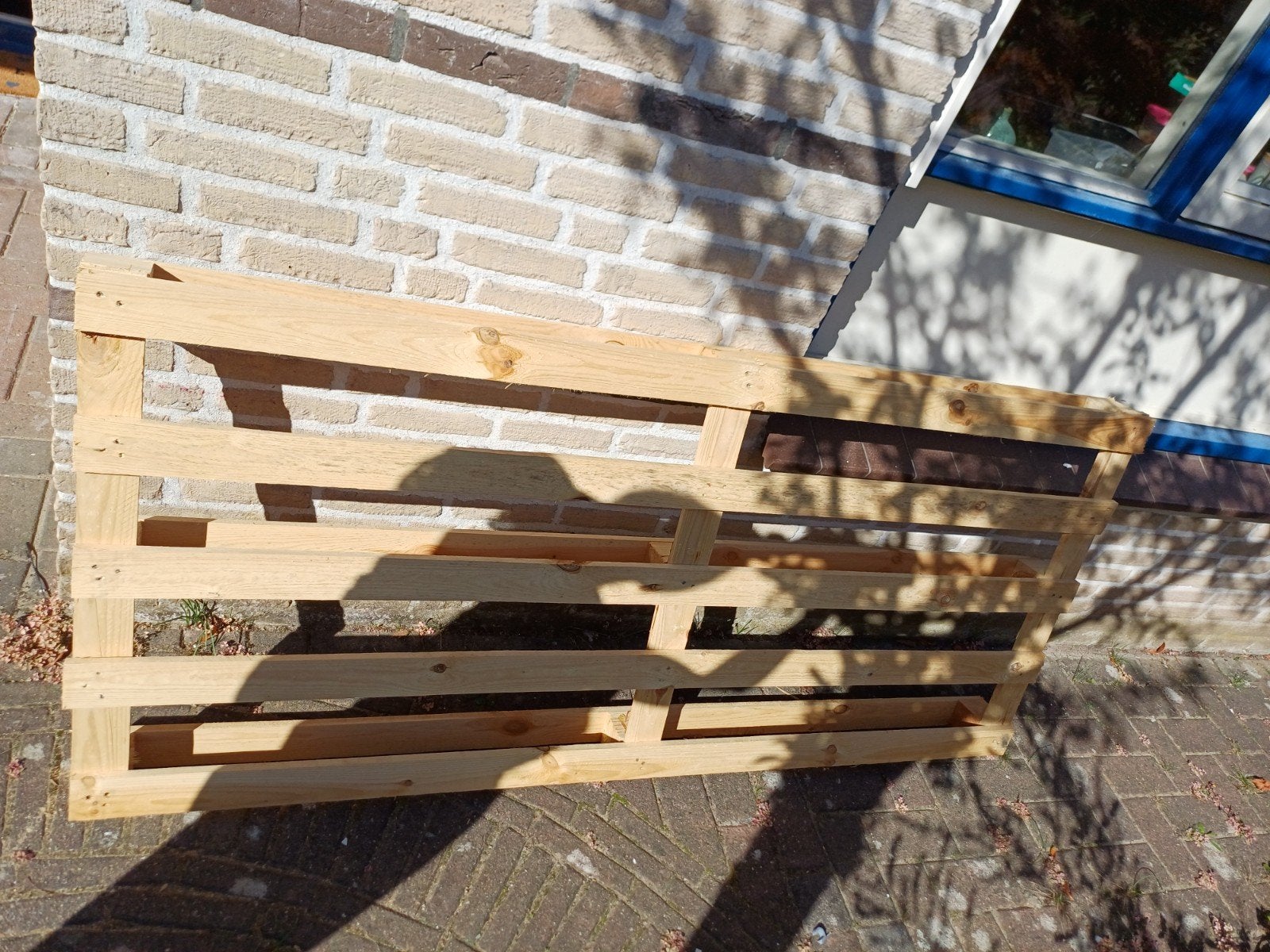 Grote houten pallet voor diverse toepassingen, Ophalen