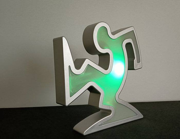 Keith Haring / La Linea Lamp Osvaldo Cavandoli zilver Nieuw!, Ophalen of Verzenden, Nieuw, Overige materialen