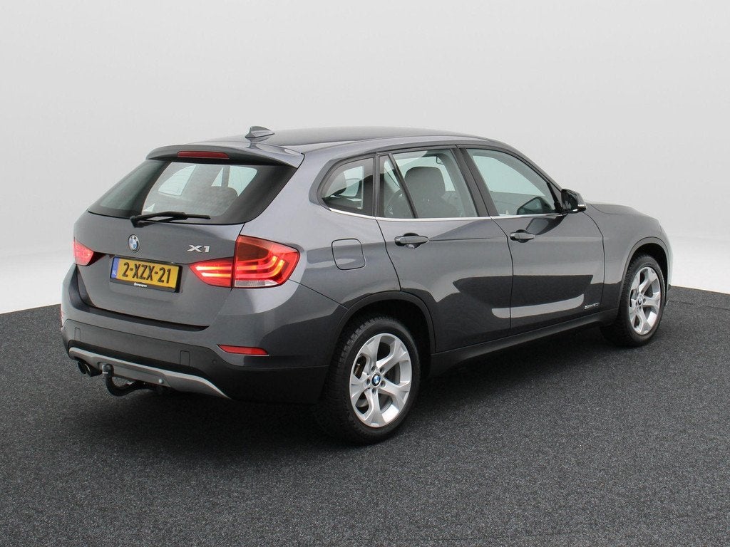 BMW X1 sDrive20i 183 Pk Automaat Executive | Trekhaak | Bi X, Auto's, BMW, Euro 6, 4 cilinders, Origineel Nederlands, Parkeersensor