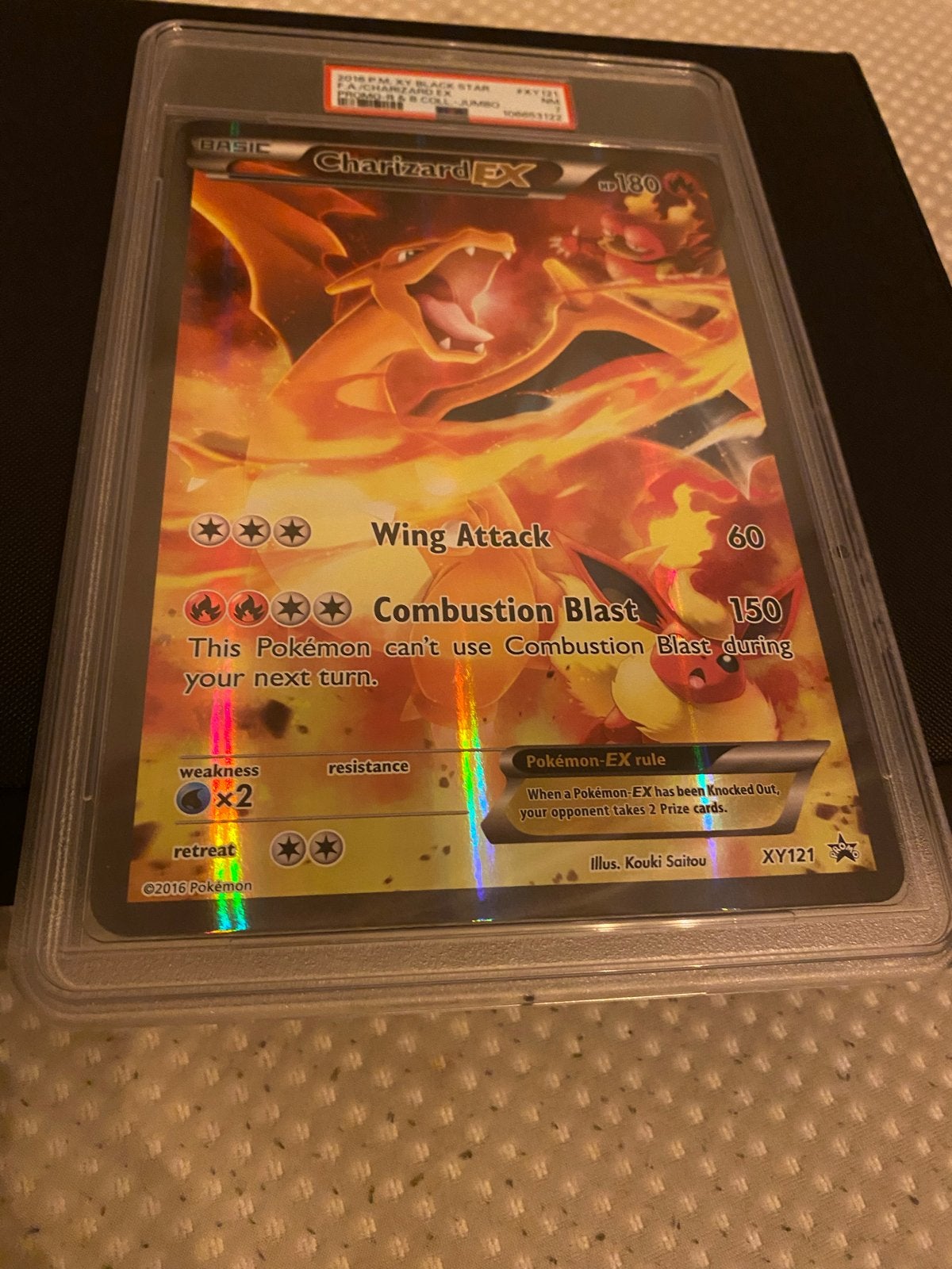 Charizard EX XY121 PSA 8 Pokémon Kaart, Ophalen of Verzenden, Zo goed als nieuw, Losse kaart, Foil