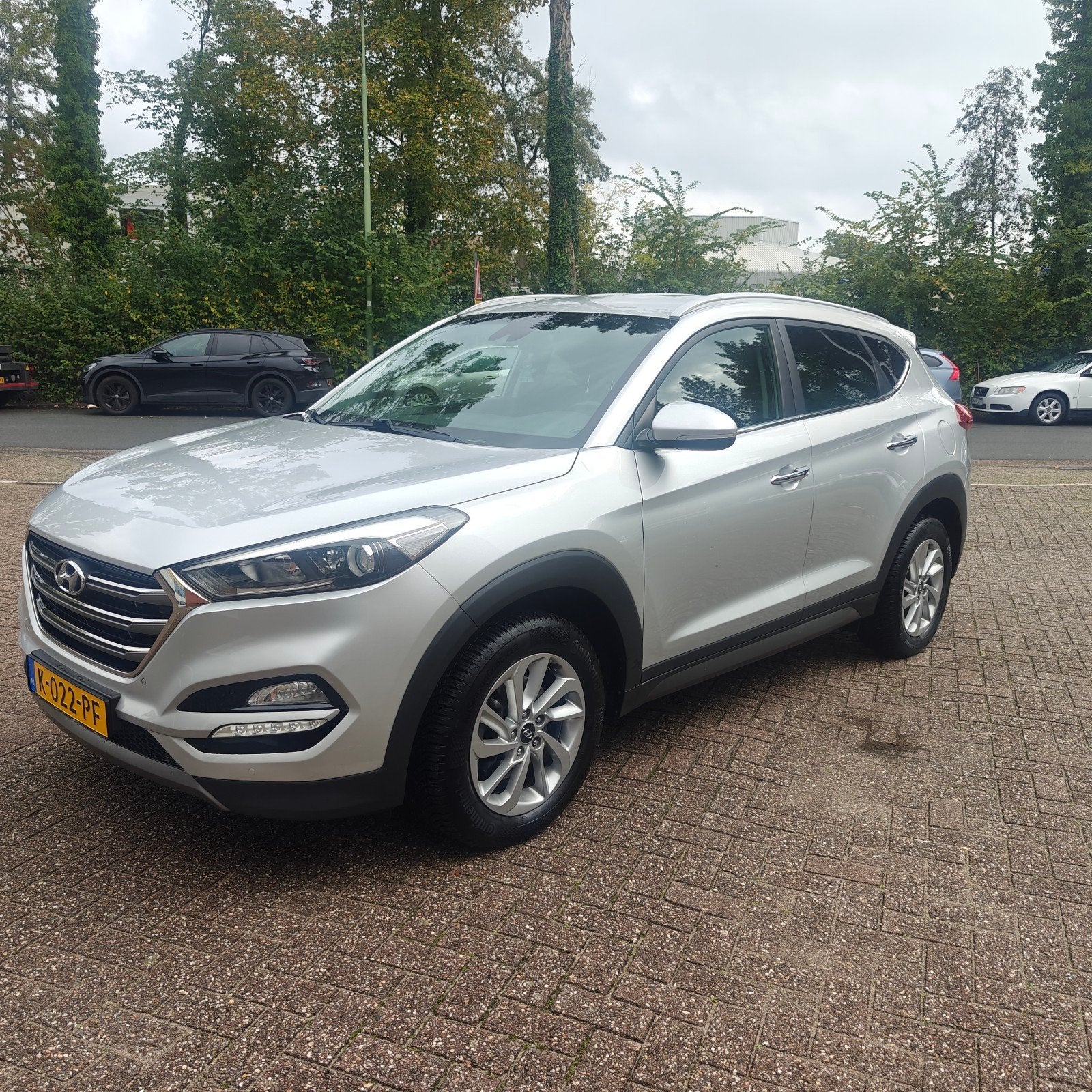 Hyundai Tucson Premium 1.6 GDi 132pk 2016 Grijs, Auto's, Voorwielaandrijving, Bluetooth, 1591 cc, 4 cilinders