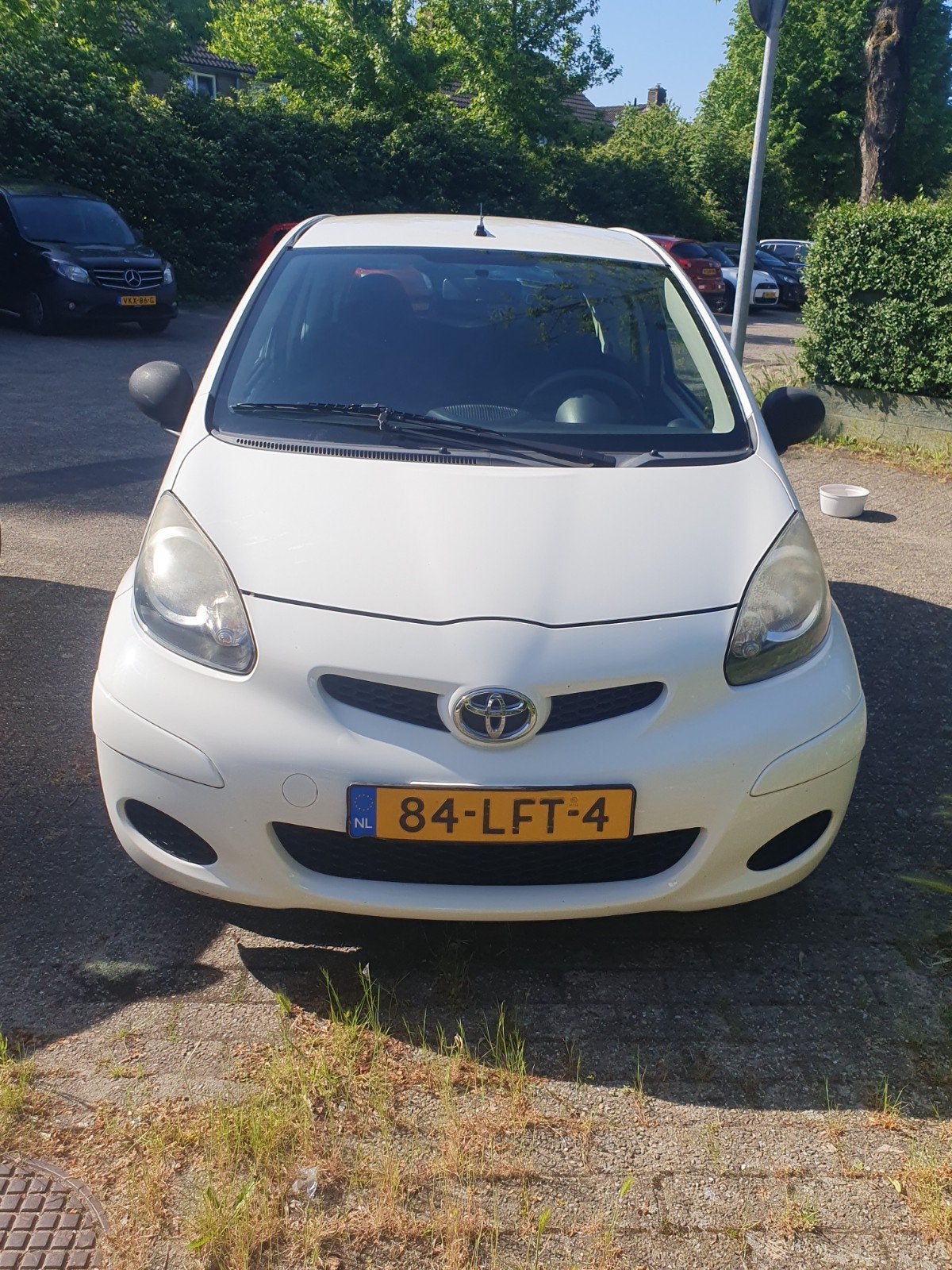 Toyota Aygo 1.0 12V Vvt-i 3DRS MMT 2010 Wit, Auto's, Voorwielaandrijving, Euro 5, Stof, Zwart