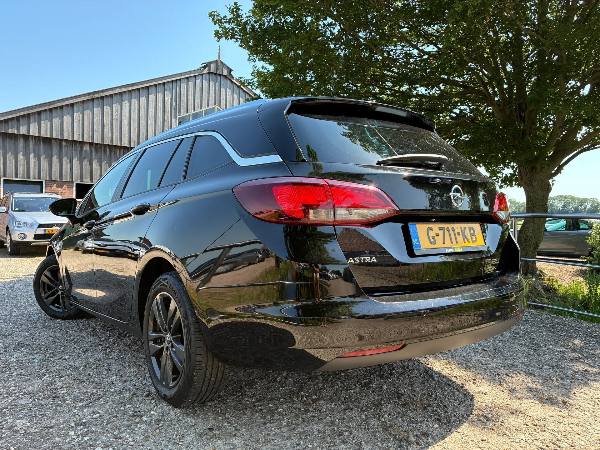 Opel Astra Sports Tourer 1.0 Turbo 120 Jaar Edition | Navi +, Stof, Gebruikt, 1178 kg, 620 kg