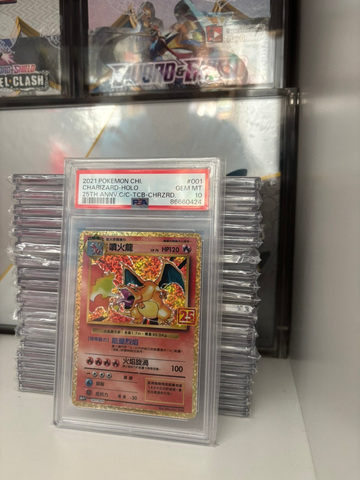 Charizard 25th Anniversary Chinees PSA 10, Ophalen of Verzenden, Nieuw, Losse kaart