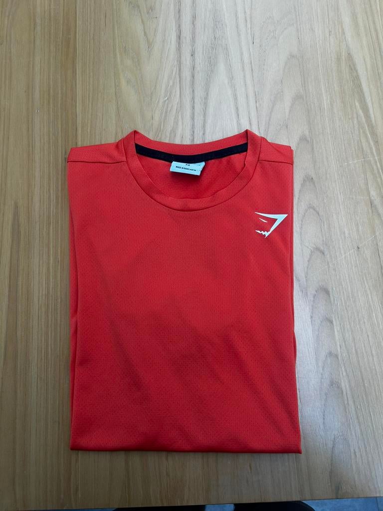Gymshark sportshirt heren oranje. Maat XS, Oranje, Ophalen of Verzenden, Zo goed als nieuw, Algemeen