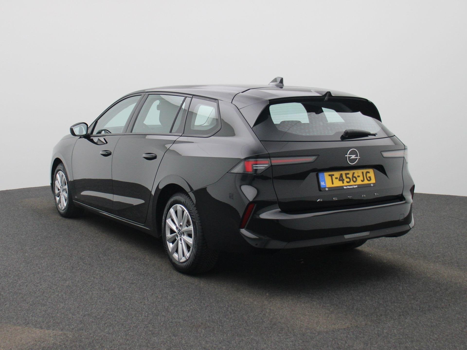 Opel Astra Sports Tourer 1.2 Turbo | Navigatie | parkeersens, Auto's, Voorwielaandrijving, 12 maanden, Stof, Gebruikt