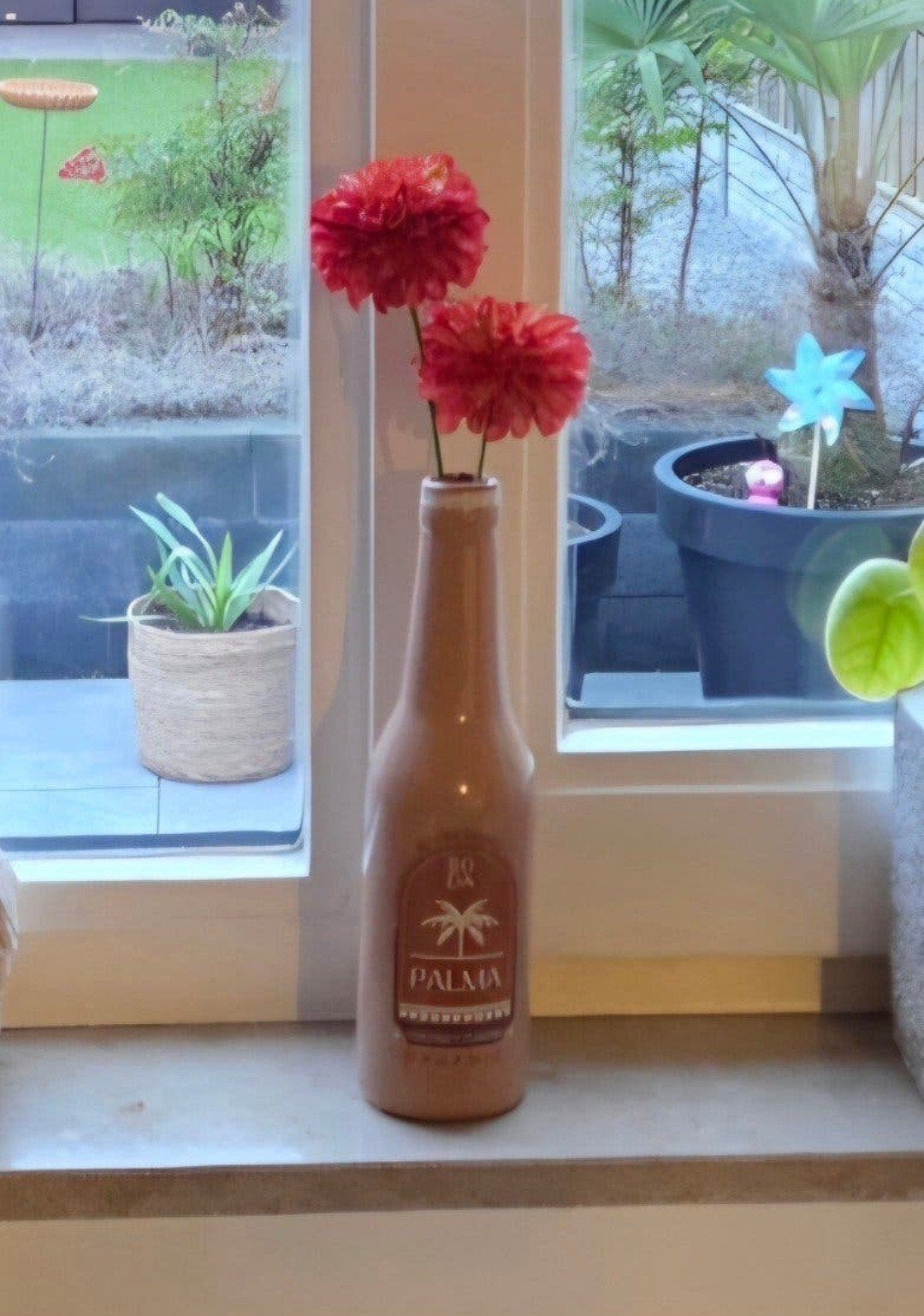 Flesje met bloemen deco palm als nieuw, Ophalen of Verzenden, Zo goed als nieuw