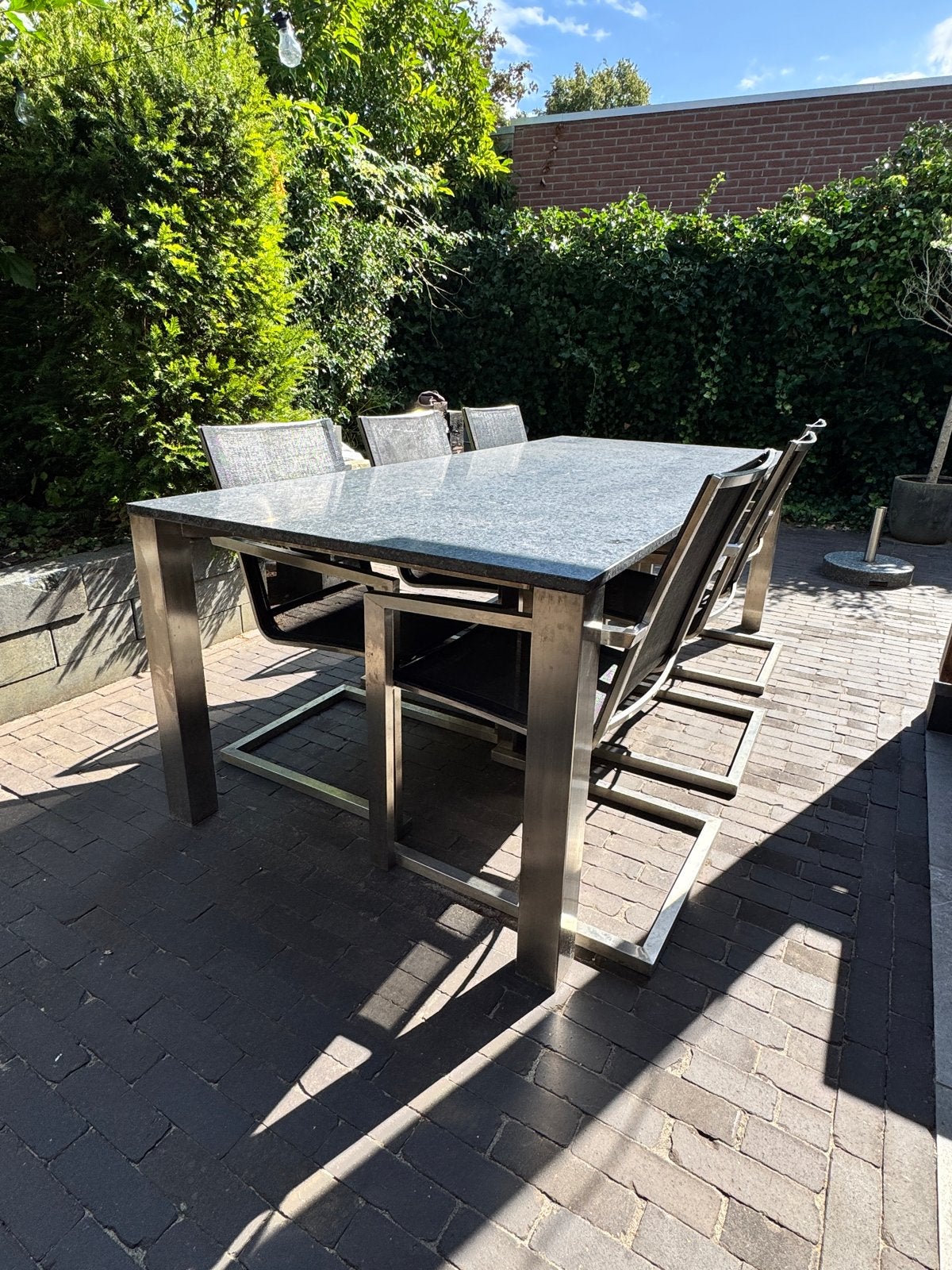 Grote tuintafel met granieten blad en RVS onderstel, Ophalen, Gebruikt, Rechthoekig, Rvs