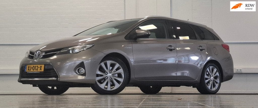 Toyota Auris Touring Sports 1.8 Hybrid Executive Pano Leer T, Auto's, Toyota, Euro 5, Gebruikt, Zwart, Bruin