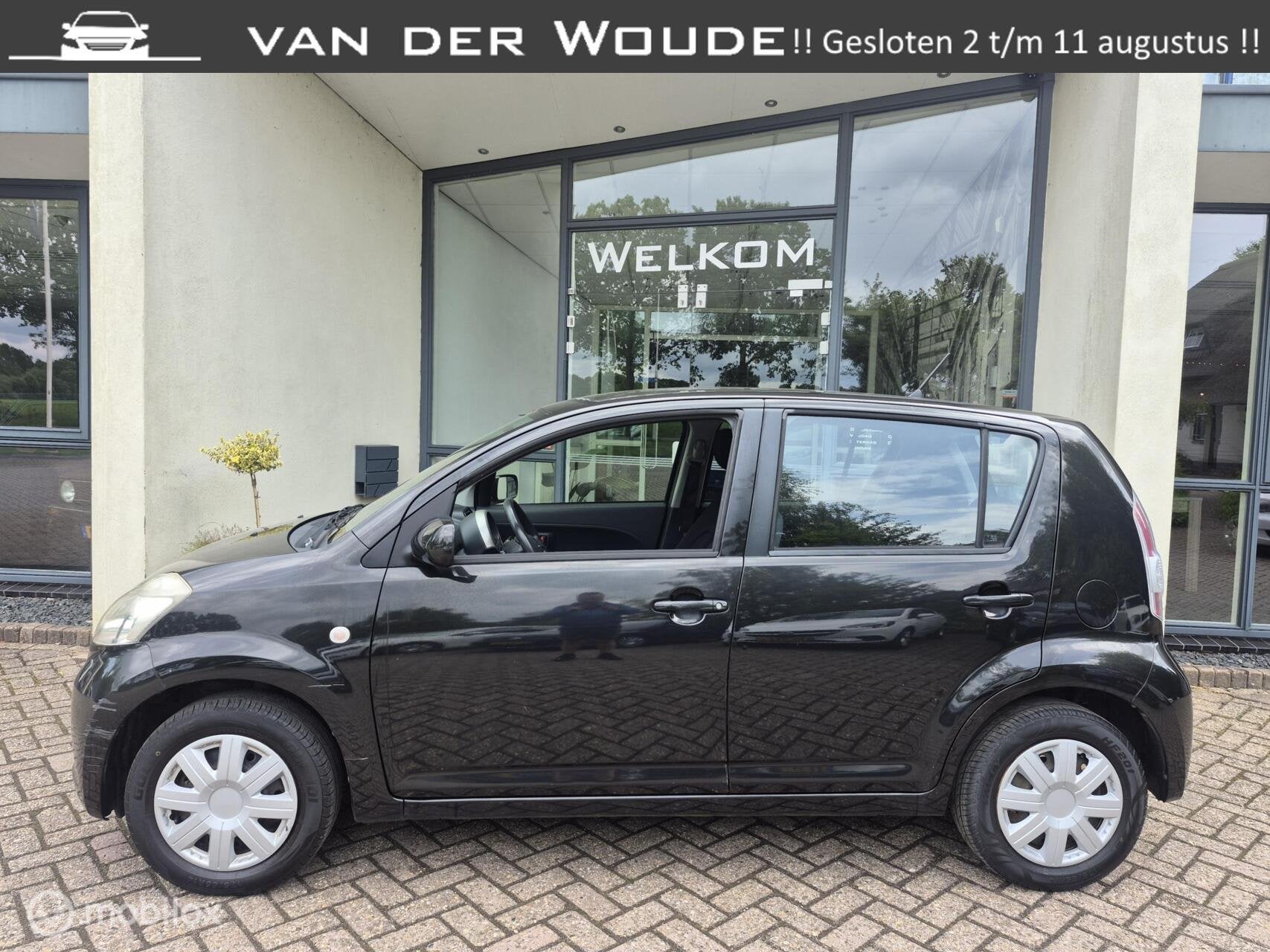 Daihatsu Sirion 2 1.0-12V Premium Elekt,pakket|29-06-27 APK!, Auto's, Voorwielaandrijving, Stof, Elektrische ramen, Zwart
