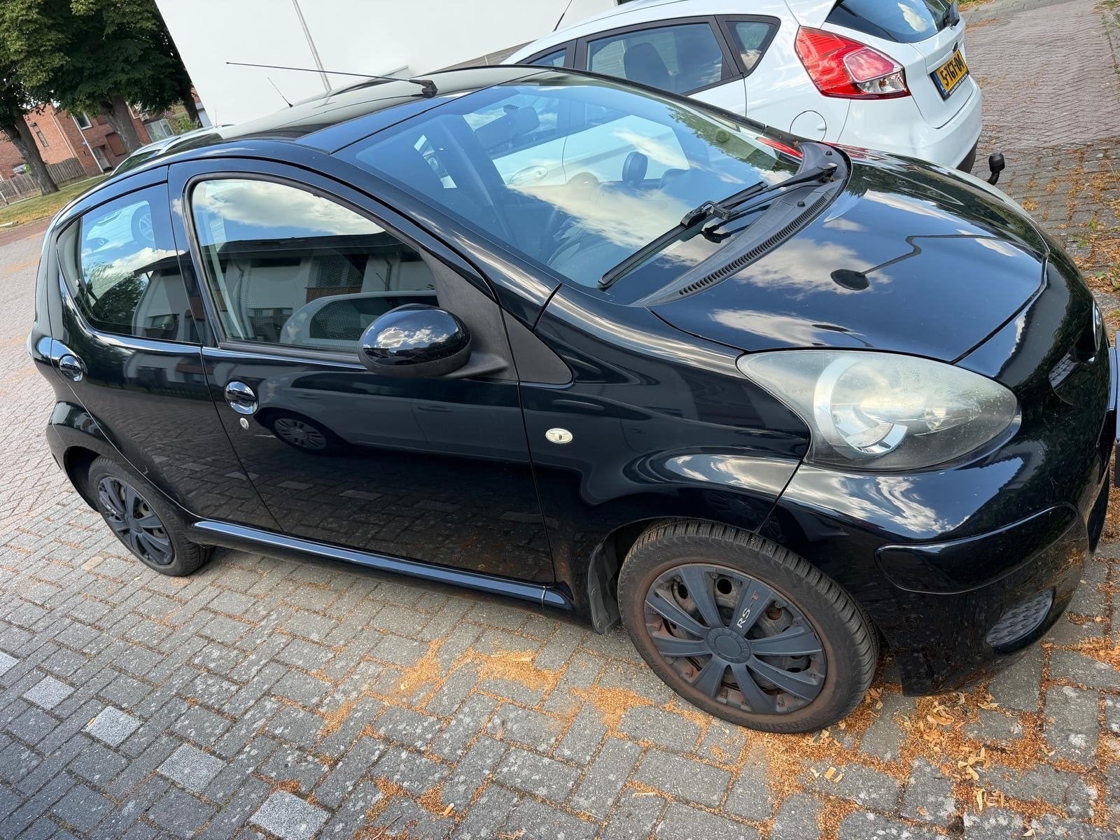 Toyota Aygo 1.0 12V Vvt-i 5DRS 2011 Zwart, Auto's, Toyota, Voorwielaandrijving, 4 stoelen, Origineel Nederlands, Handgeschakeld