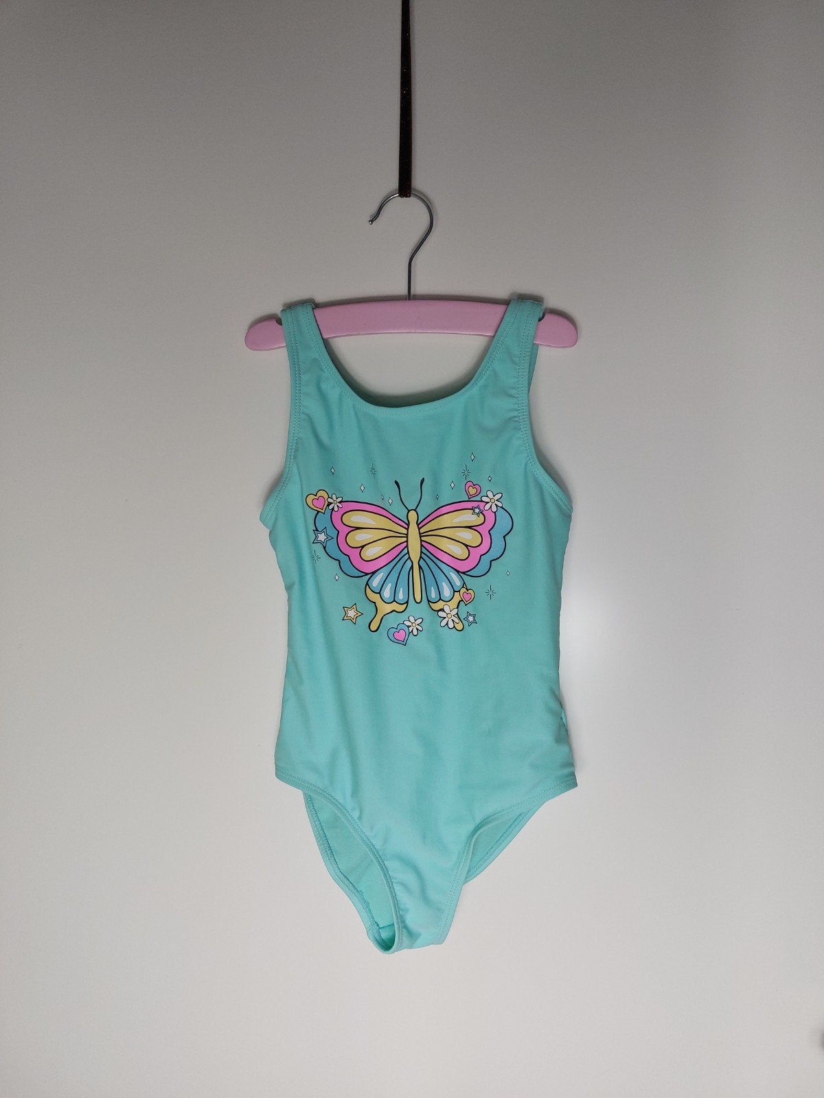 Mooi badpak in maat 122 z.g.a.n., Meisje, Sport- of Zwemkleding, Ophalen of Verzenden, Zo goed als nieuw