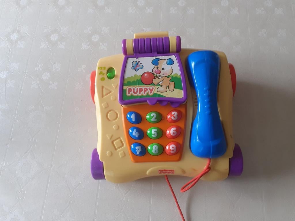 Fisher price telefoon met licht en geluid, Ophalen of Verzenden, Meer dan 50 stukjes, Zo goed als nieuw, 6 maanden tot 2 jaar