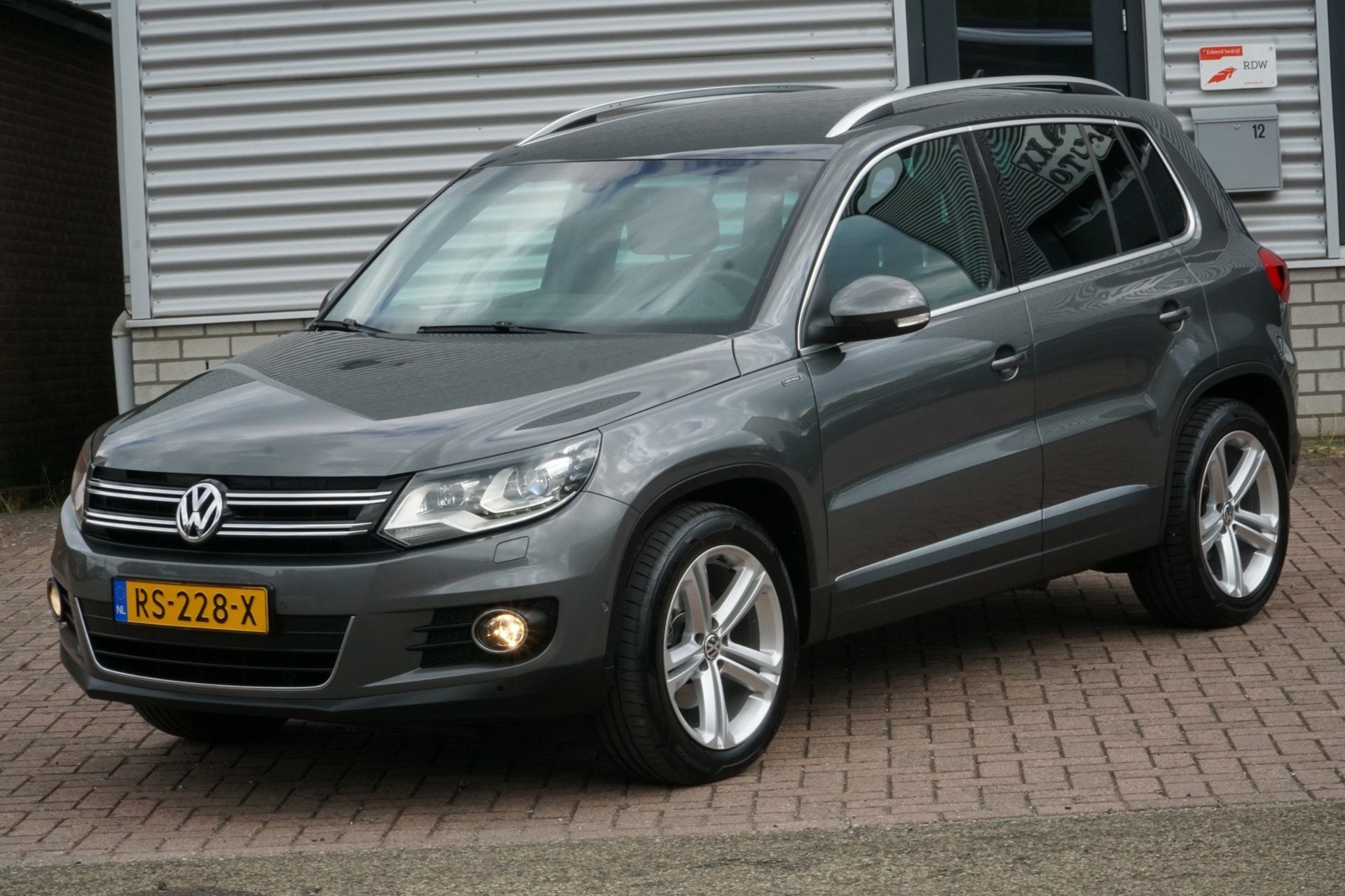 Volkswagen Tiguan 1.4 TSI Sport&Style NIEUWSTAAT, 4 cilinders, Alcantara, 1451 kg, 14 km/l