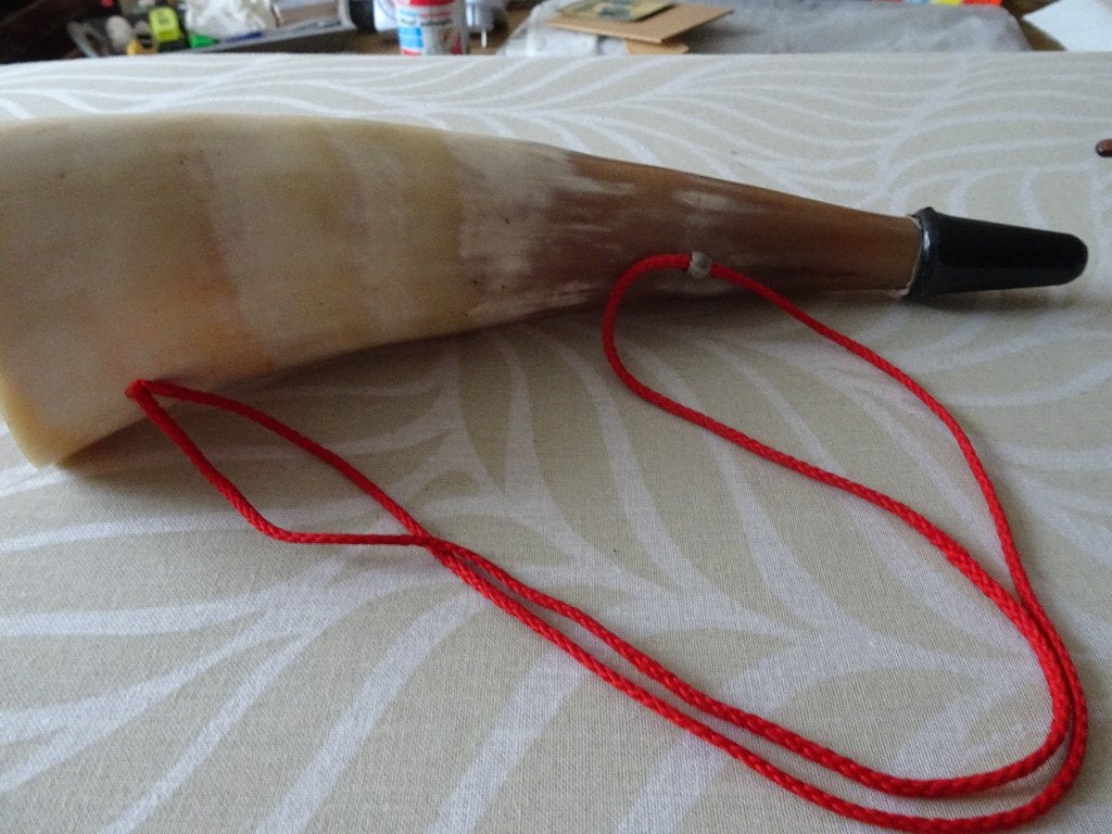 Koehoorn blaasinstrument voor jacht of boerenland, Ophalen