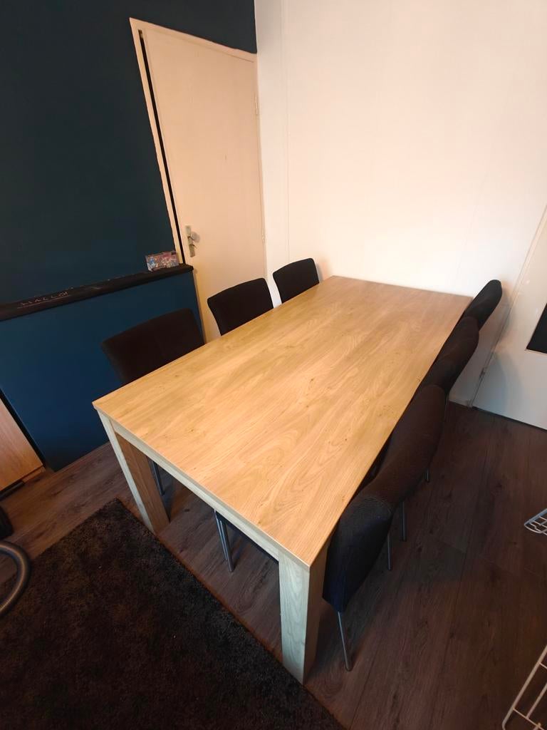 Eettafel met zes stoelen, Ophalen