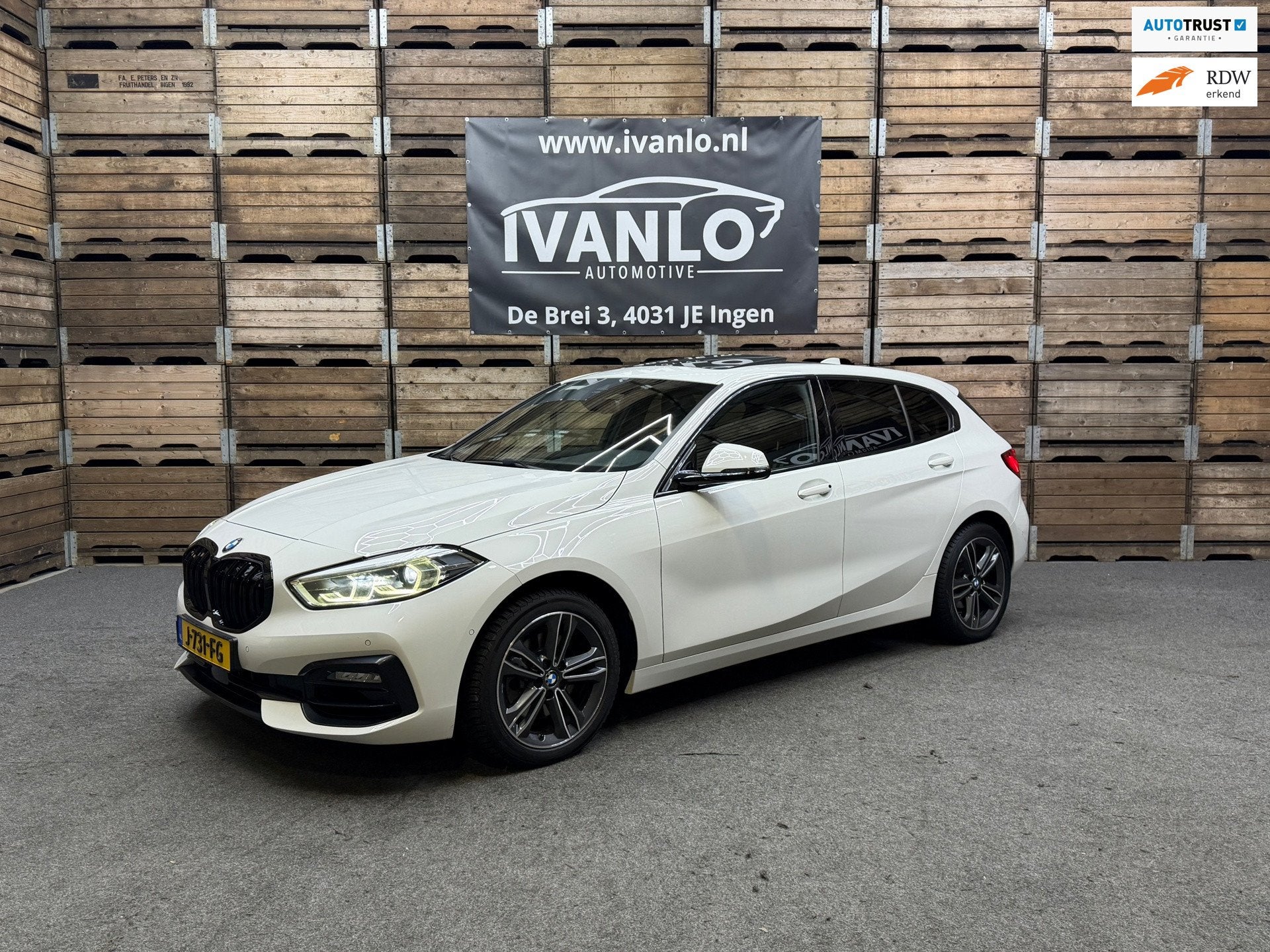 BMW 1-serie 118i High Executive Sport Line Pano LED VCP PDC, Auto's, Dealer onderhouden, Parkeerassistent, Gebruikt, Leder en Stof