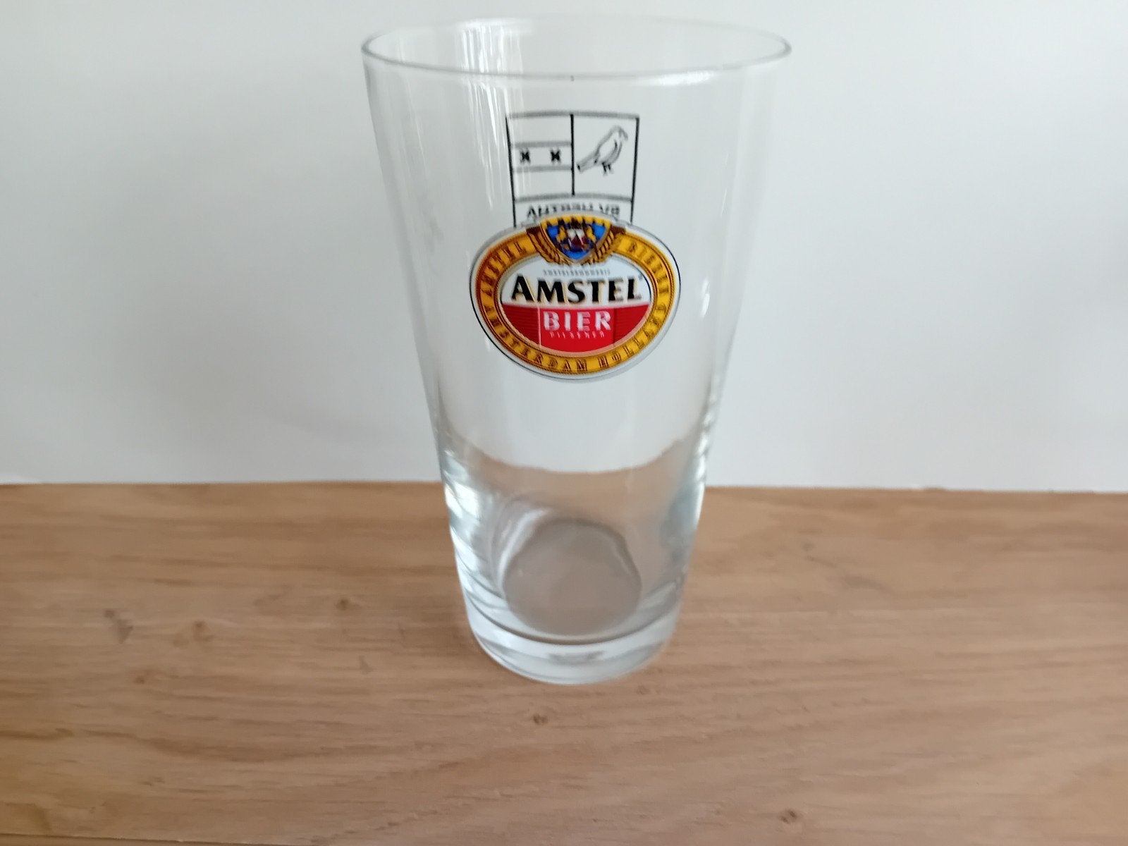 Amstel glas nummer 4 met achteropdruk, Verzamelen, Ophalen of Verzenden, Zo goed als nieuw, Glas of Glazen, Amstel
