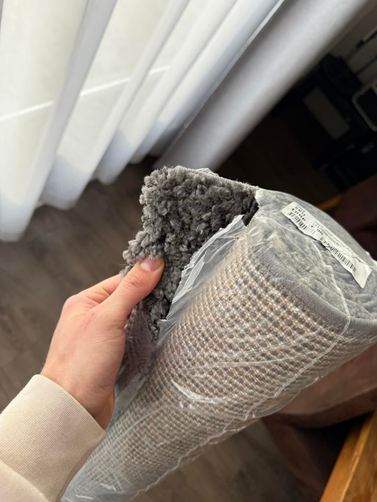 Nieuw vloerkleed hoogpolig, Ophalen