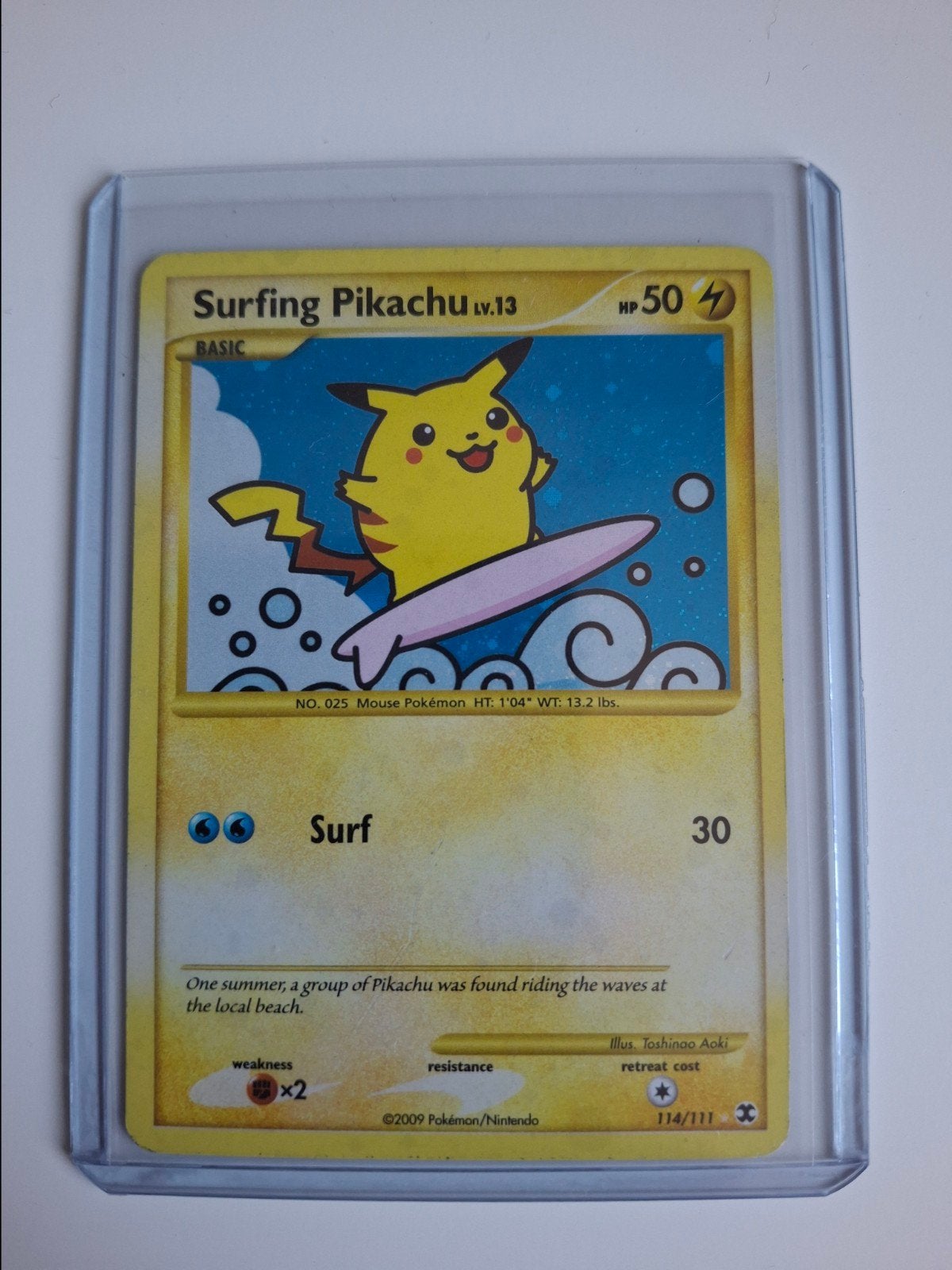 Surfing pikachu 114/111 2009 Pokémon kaart in goede staat, Ophalen of Verzenden