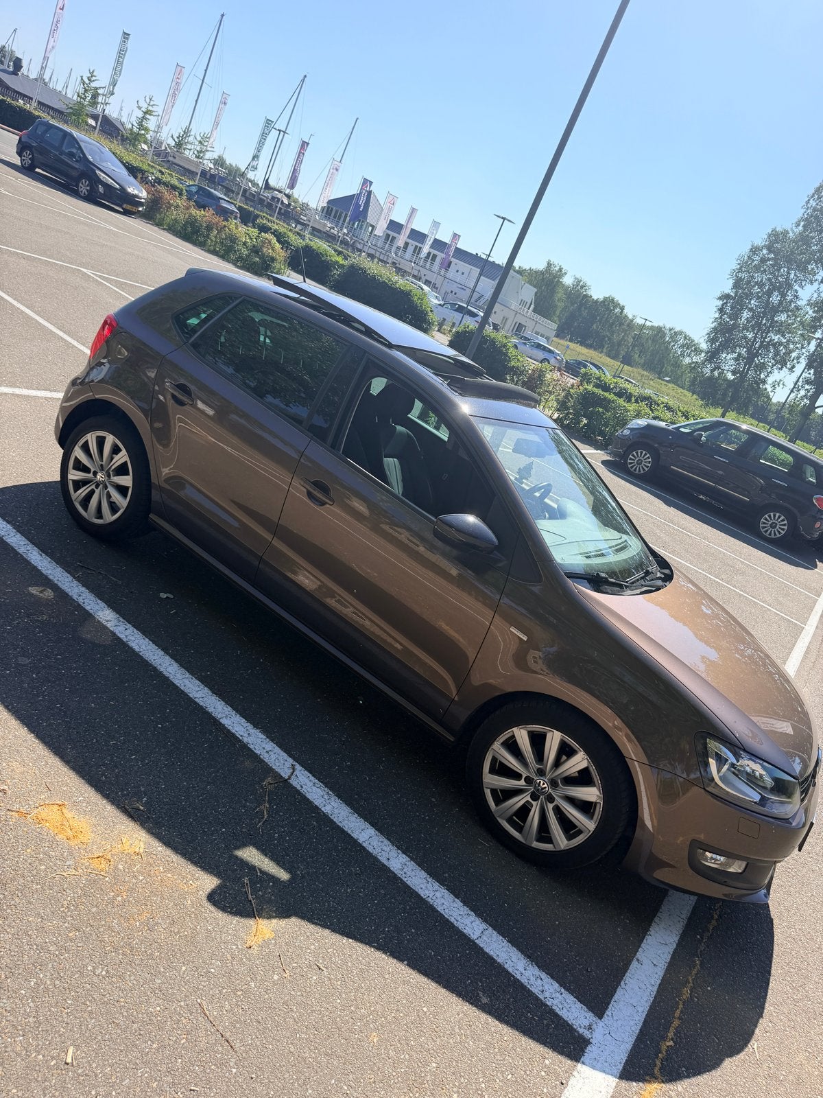 Volkswagen Polo 1.2 TSI 66KW 2012 Bruin, Auto's, Volkswagen, Voorwielaandrijving, 40 €/maand, Zwart, 4 cilinders