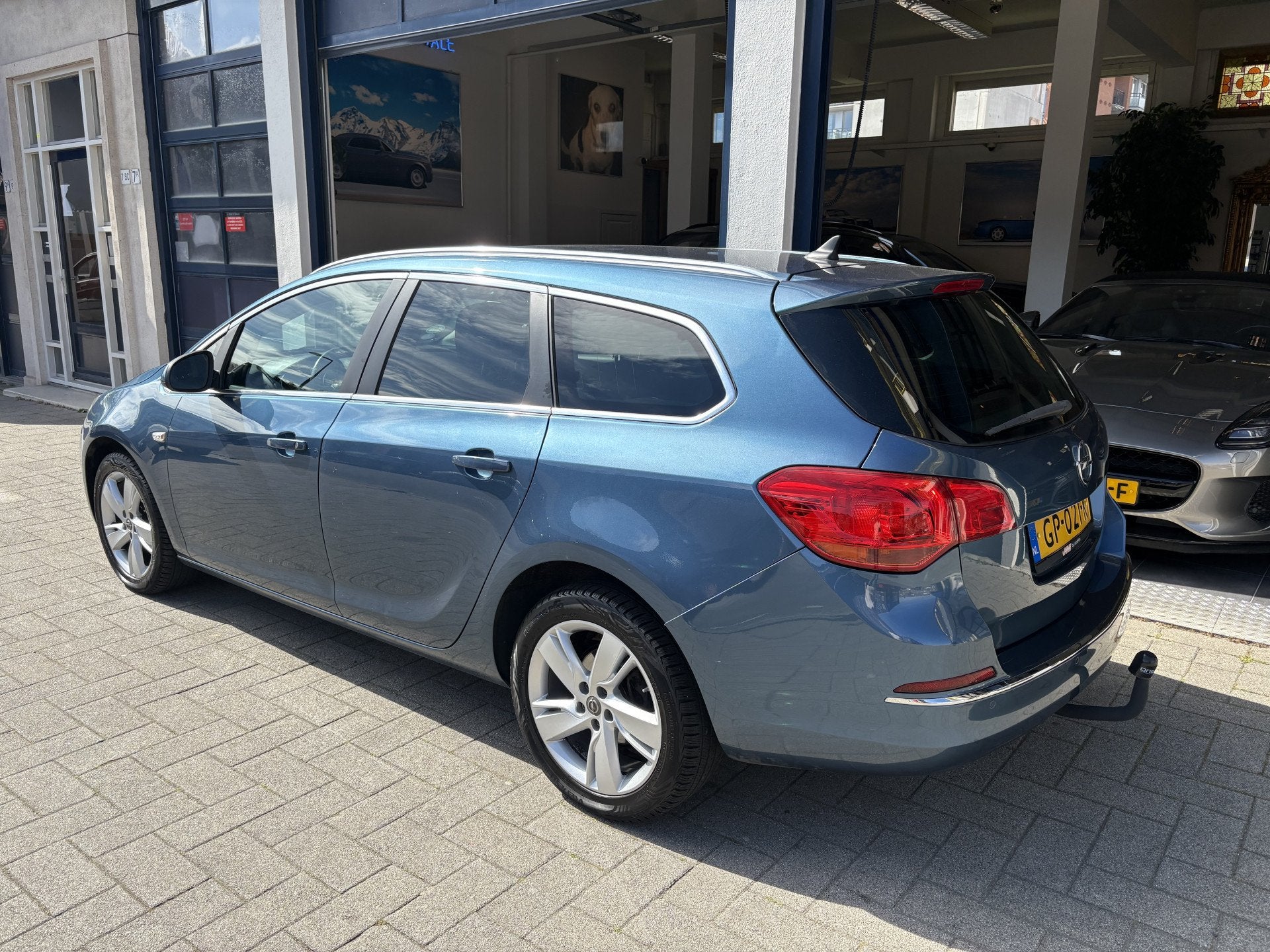 Opel Astra Sports Tourer 1.4 Business + NW APK/NAVI/CLIMA, Voorwielaandrijving, 101 pk, Gebruikt, 4 cilinders
