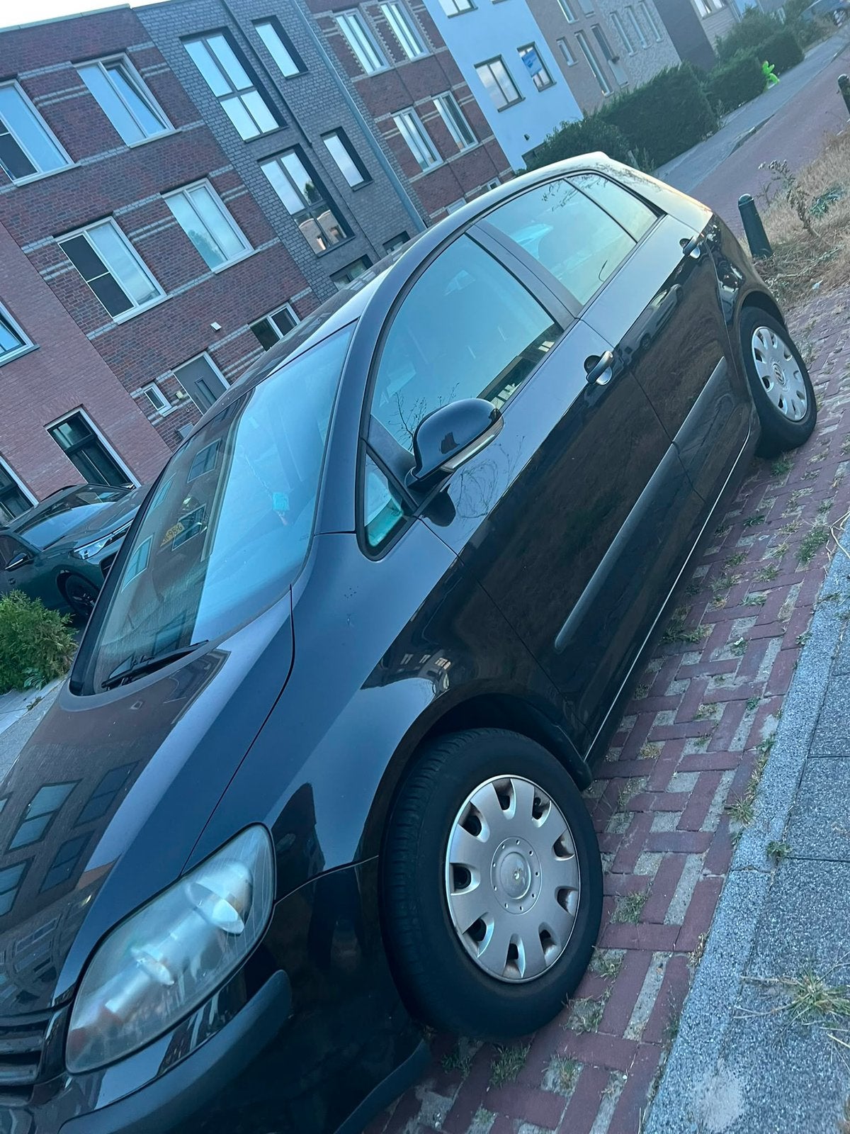 Volkswagen Golf Plus 1.6 FSI 85KW AUT 2006 Zwart, Auto's, 4 cilinders, Zwart, 1200 kg, 115 pk