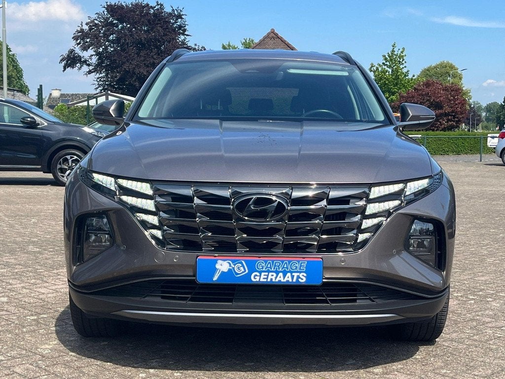 Hyundai Tucson 1.6 T-GDI HEV Comfort | Elektrische stoel, St, Stof, Gebruikt, Euro 6, Overige kleuren
