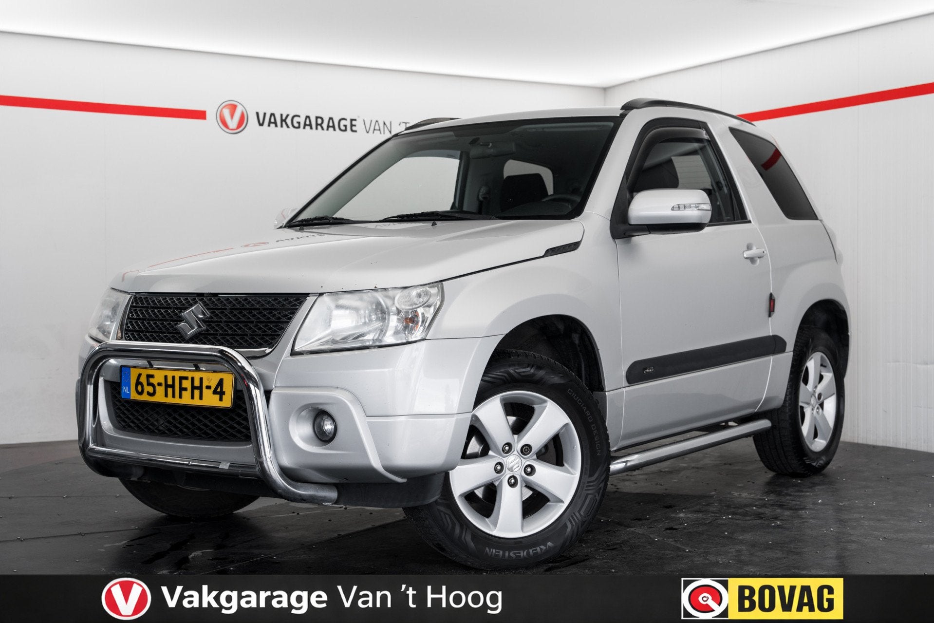 Suzuki Grand Vitara 2.4 Exclusive (bj 2008, automaat), Auto's, Suzuki, Automaat, Stof, Gebruikt, Zwart