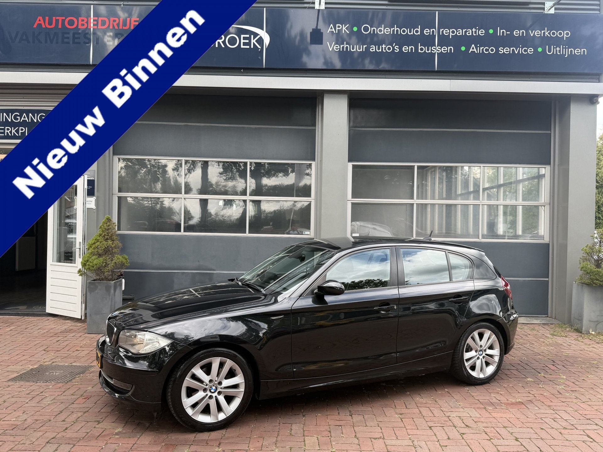 BMW 1-serie 118i Business Line leer,16inch,clima,airco 2010, 1-Serie, Achterwielaandrijving, Zwart, Automatische klimaatregeling