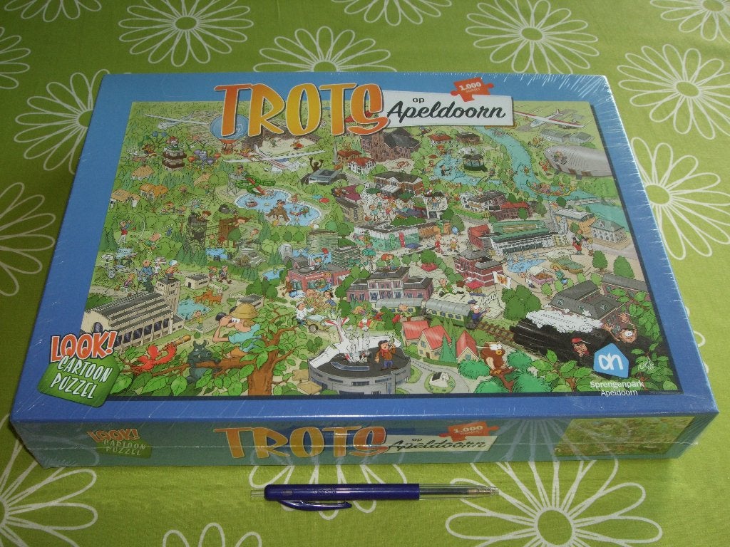 Nieuw in seal: Trots op Apeldoorn cartoon puzzel - 1000 st, Ophalen of Verzenden, 500 t/m 1500 stukjes, Nieuw, Legpuzzel