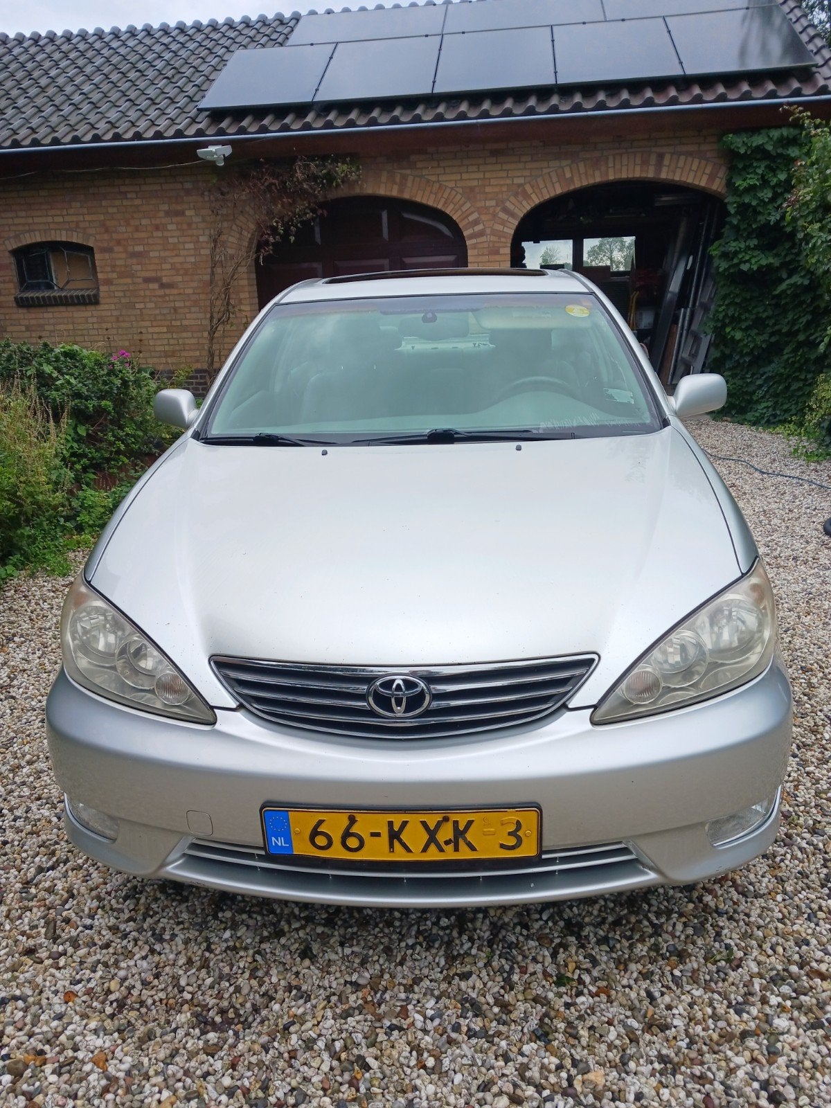 2005 Toyota Camry XLE  V6 3.0 L Lunar Mist Metallic Grijs, Auto's, Dealer onderhouden, 28 km/l, Camry, Leder