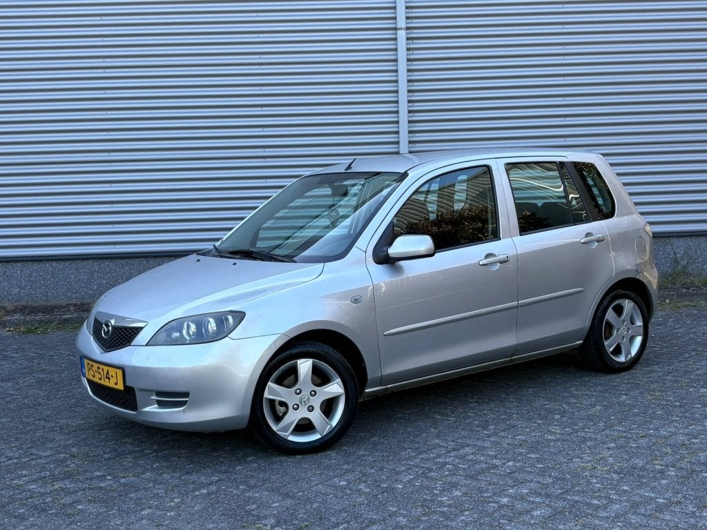 Mazda 2 1.4 Exclusive AUTOMAAT Airco Trekhaak APK Velgen Cli, Auto's, Automaat, Gebruikt, Zwart, 4 cilinders