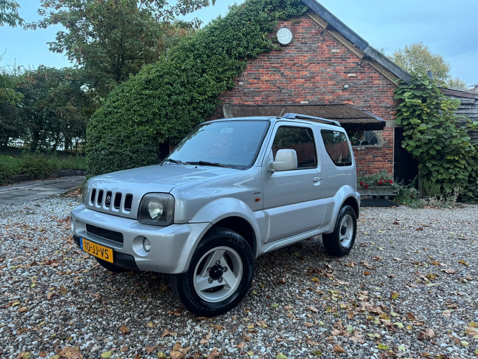 Suzuki Jimny 1.3 JX 4WD Special Edition Grijs, Metal top 4X4, Auto's, 13 km/l, Stof, 40 €/maand, 4 cilinders