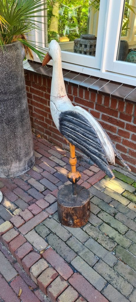 houten ooievaar, Ophalen, Gebruikt, Dier