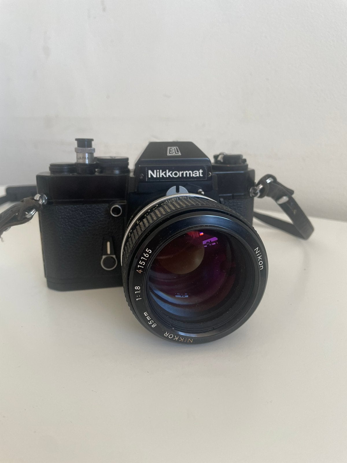 Nikon Nikkormat EL analoge camera + Nikkor 85mm f/1.8 lens, Audio, Tv en Foto, Fotocamera's Analoog, Ophalen of Verzenden, Zo goed als nieuw