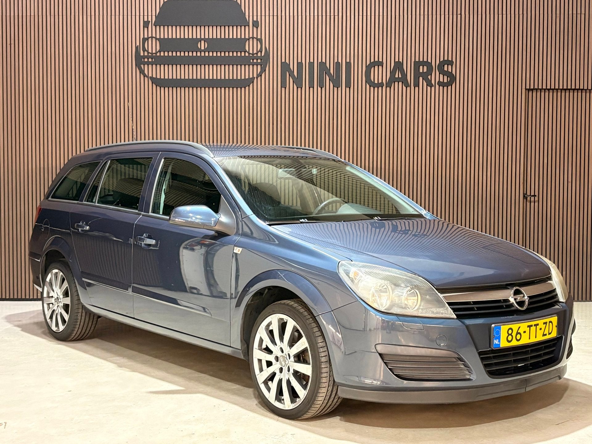 Opel Astra Wagon 1.6 Edition nieuwe APK NAP trekhaak, Auto's, Voorwielaandrijving, Gebruikt, Zwart, 4 cilinders